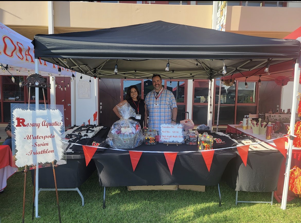 Parents help out at a sports booth (Photo Provided by Bernadette Stroud)