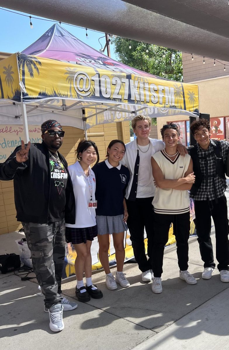 Authors of this article pose with KISS FM DJ, Tye Hollywood, and three of the Full Circle boys (more like 3/4 Circle boys). 