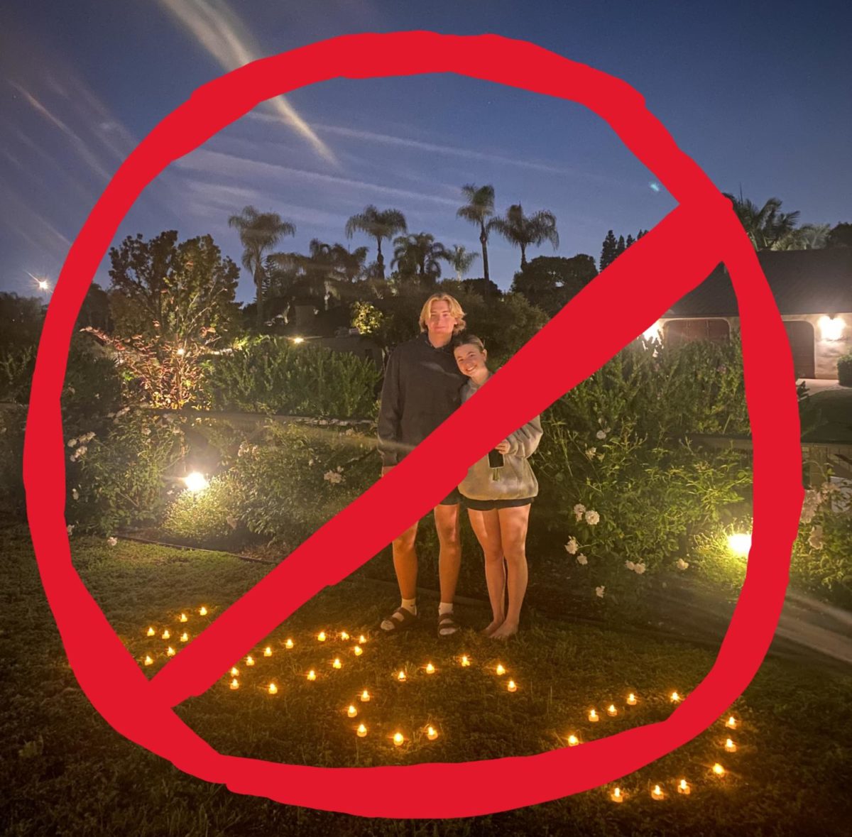 Senior Lily Curtis happily poses with her boyfriend after his extravagant HOCO proposal.