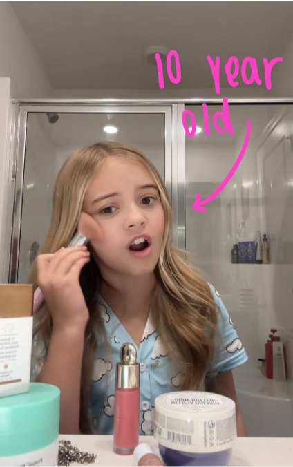 Here's a ten year old showing the camera all her products while applying them. 