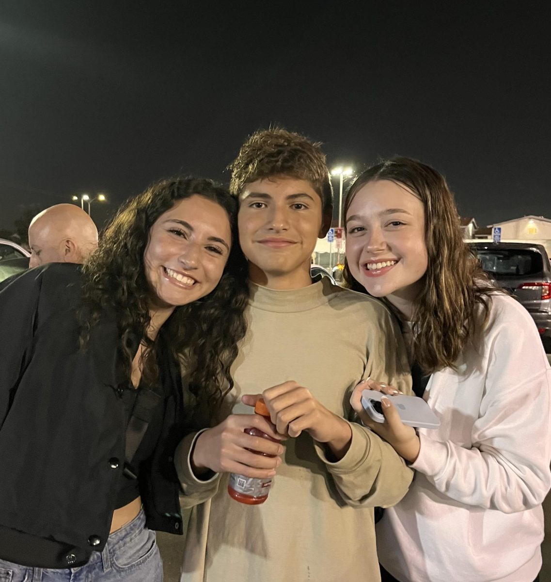 Lainey and Finley Hawkins '24 pose with Lainey's brother, Nick.