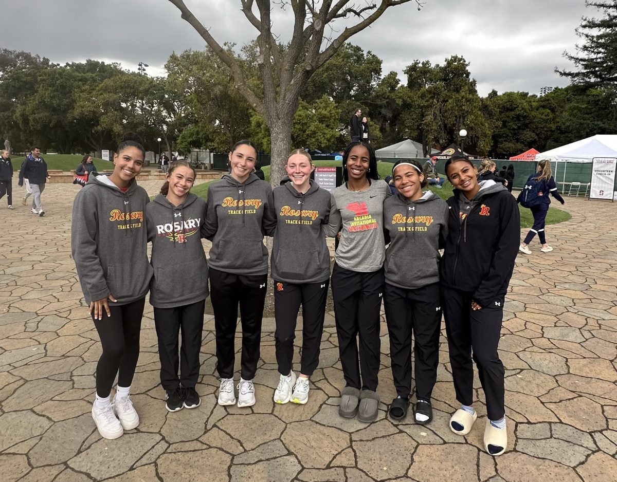 Missing Sol Lee' 24, the Rosary Stanford crew smiles for a picture after a successful meet.