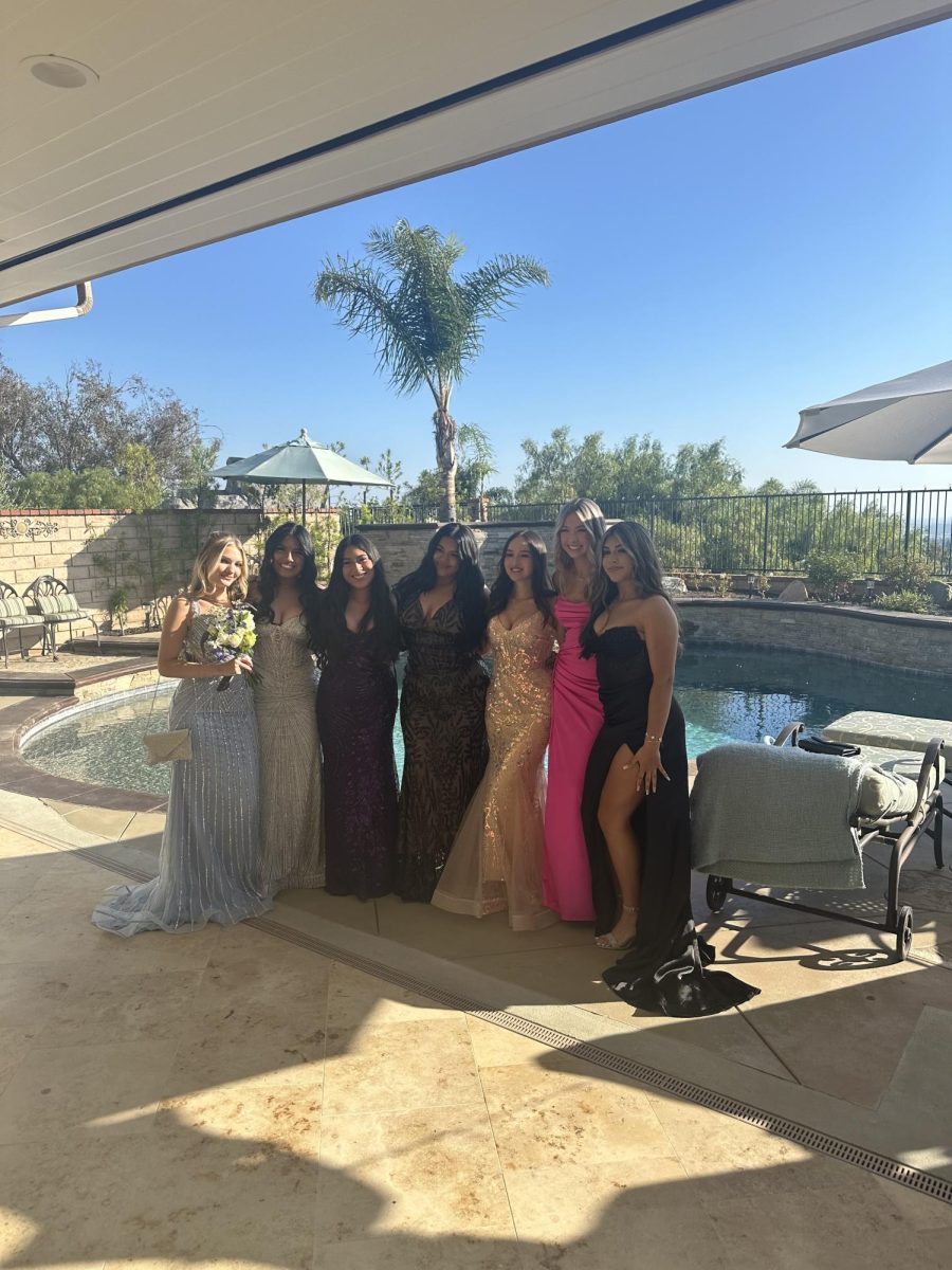 Melanie Alban '25 and her group met to take pictures and eat dinner before Prom.