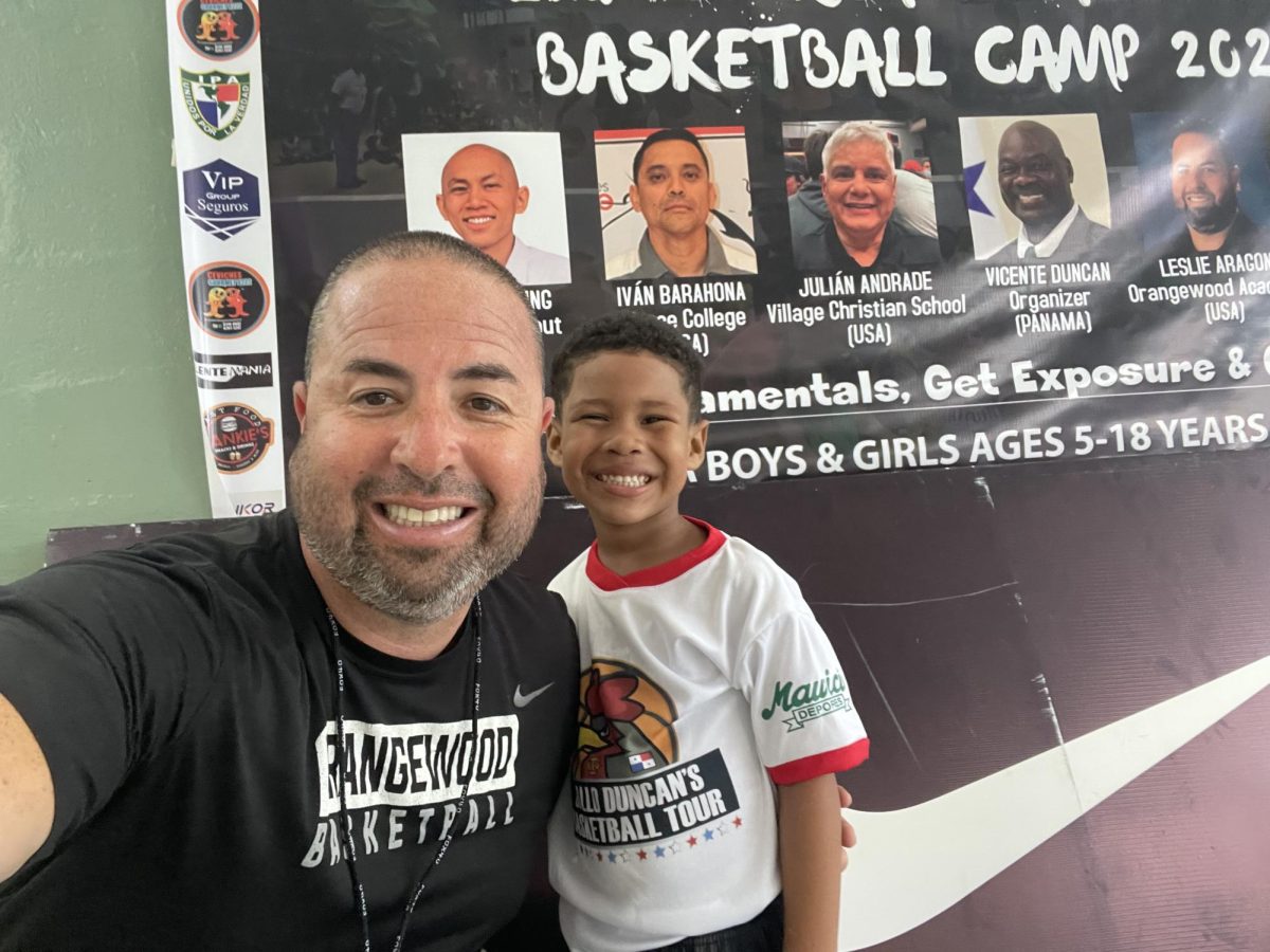 Mr. Aragon helping at a basketball clinic in Panama over the summer.