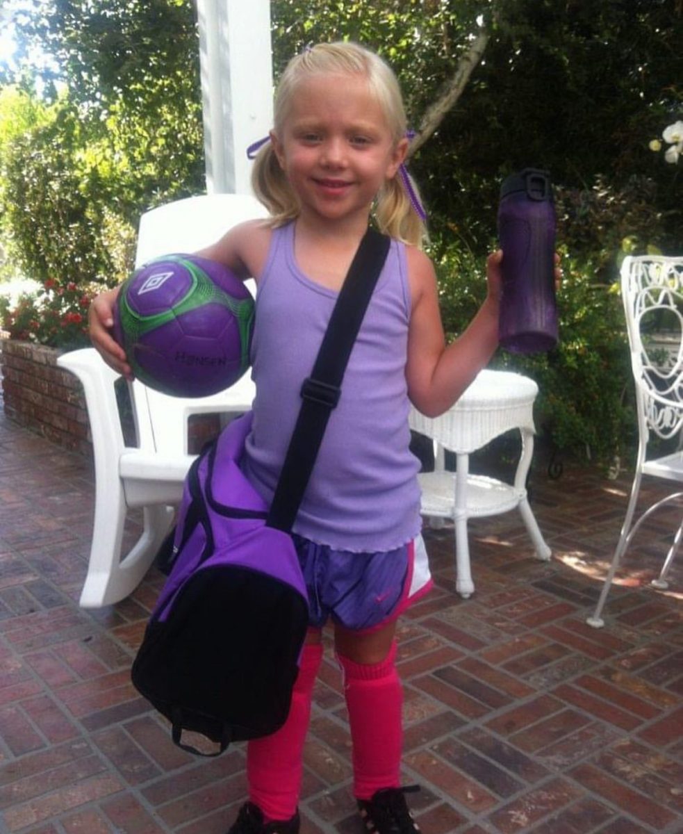 Look at little baby Addie smiling for her first soccer practice.