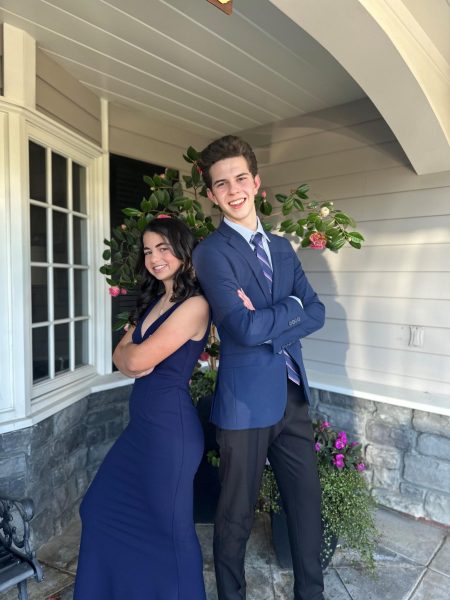 Molly '27 and Patrick '26 Hasset smile big before a formal event.