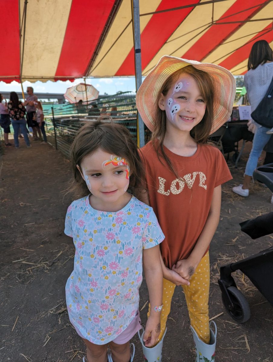 Mr. Fusco's daughters are all smiles in this photo!