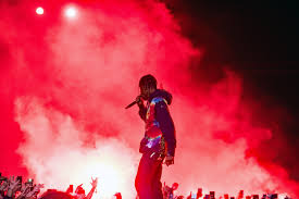 Travis Scott is performing amid those mysterious fog machines.