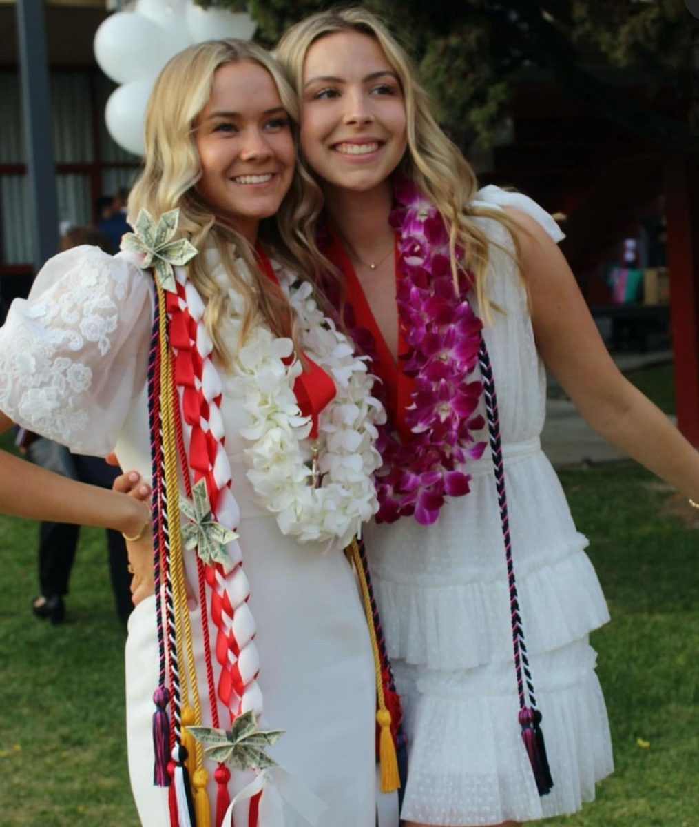 Evelyn and Daly posing at their baccalaureate mass.