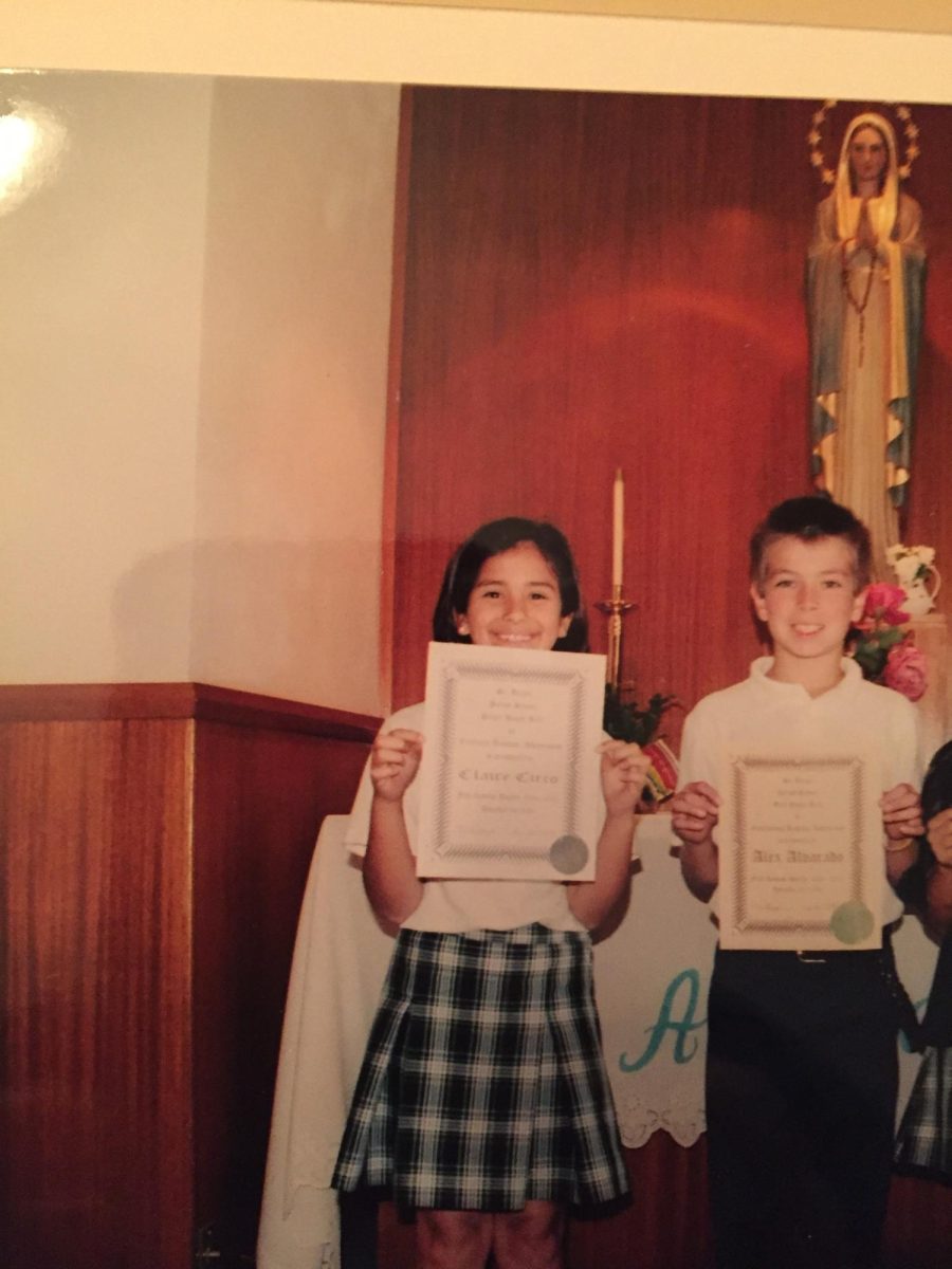 Mrs. Flores receives a certificate award during her Elementary school years!