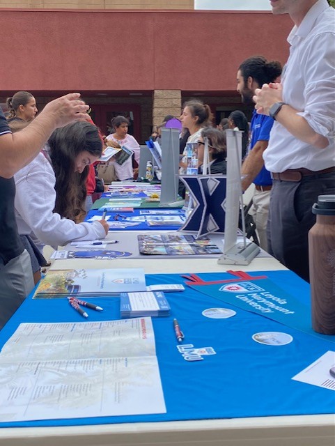 Multiple colleges set up their tables for information and interactions!