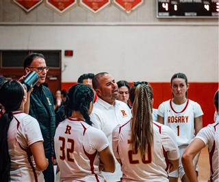 Mr. Aragon gives us a pep talk to get us fired up to finish the game.