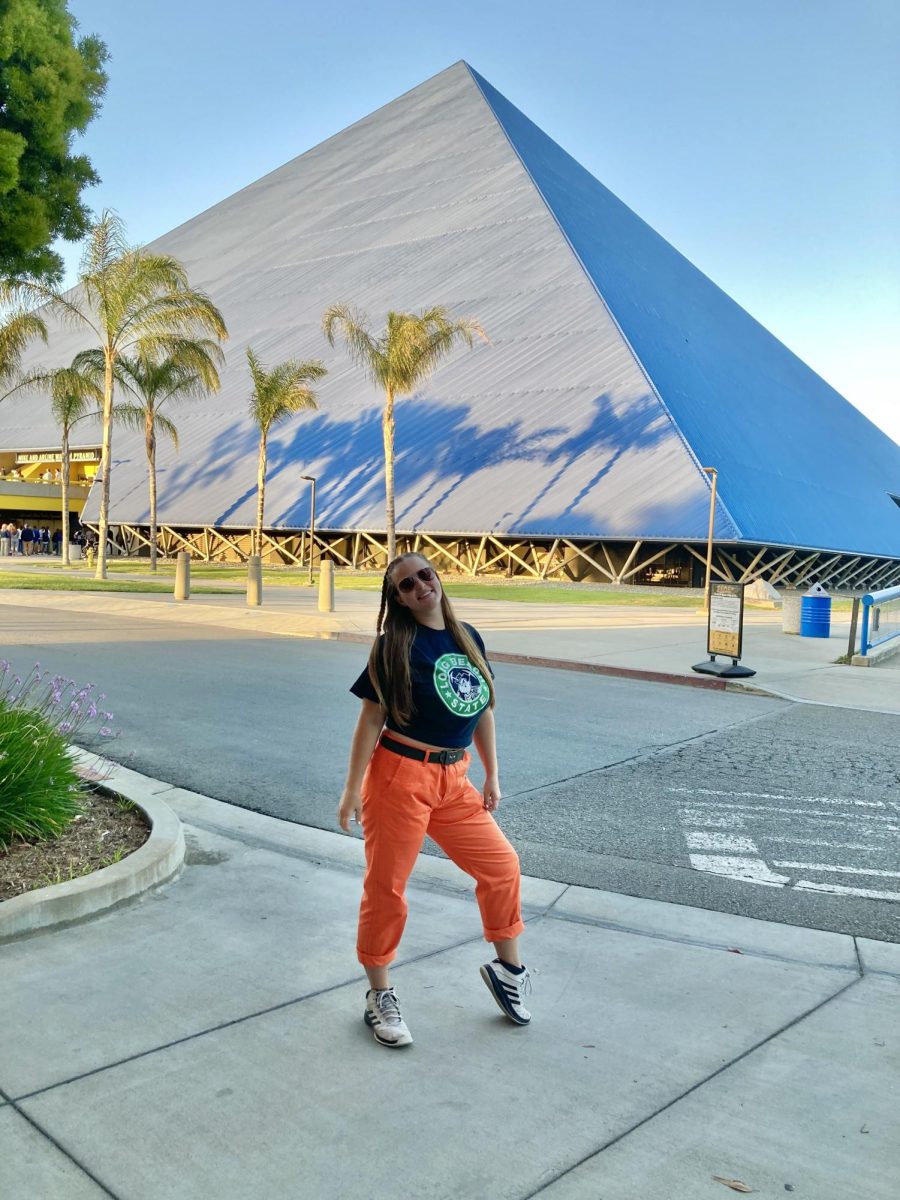 Here is Ms. Sutcliffe outside of the pyramid of the CSULB campus before attending a basketball game.