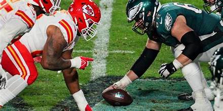 Chiefs and Eagles players facing off against each other. (Photo provided by Google via Creative Commons License)