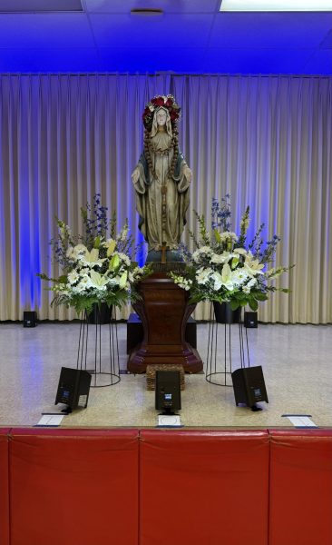 Here is Mary, Queen of May, crowned in her crown of flowers. 