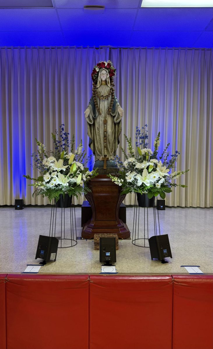 Here is Mary, Queen of May, crowned in her crown of flowers. 