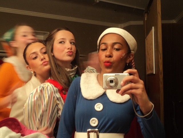 Apia enjoys a break backstage with her friends!