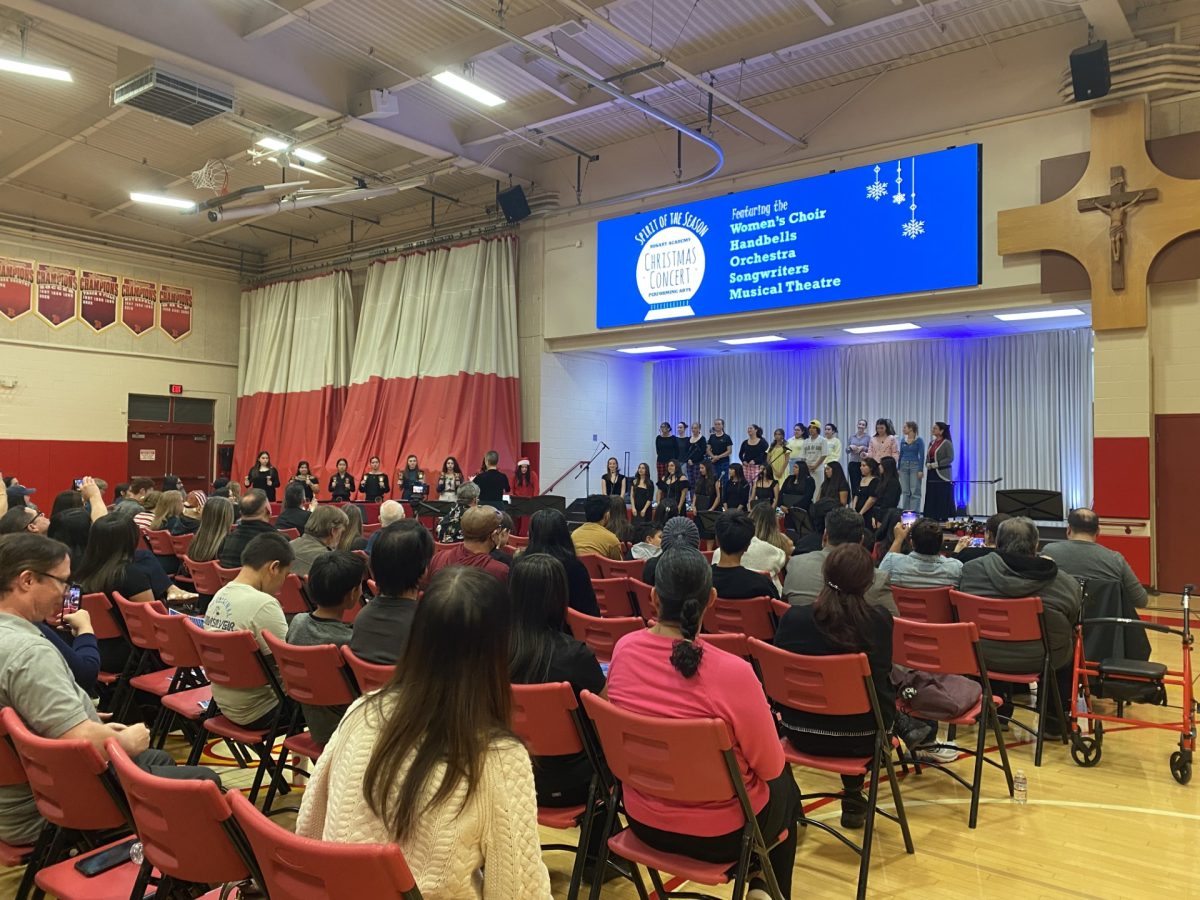 At the end of the Christmas concert, all of the music program members took to the stage for the annual singing of "Silent Night."