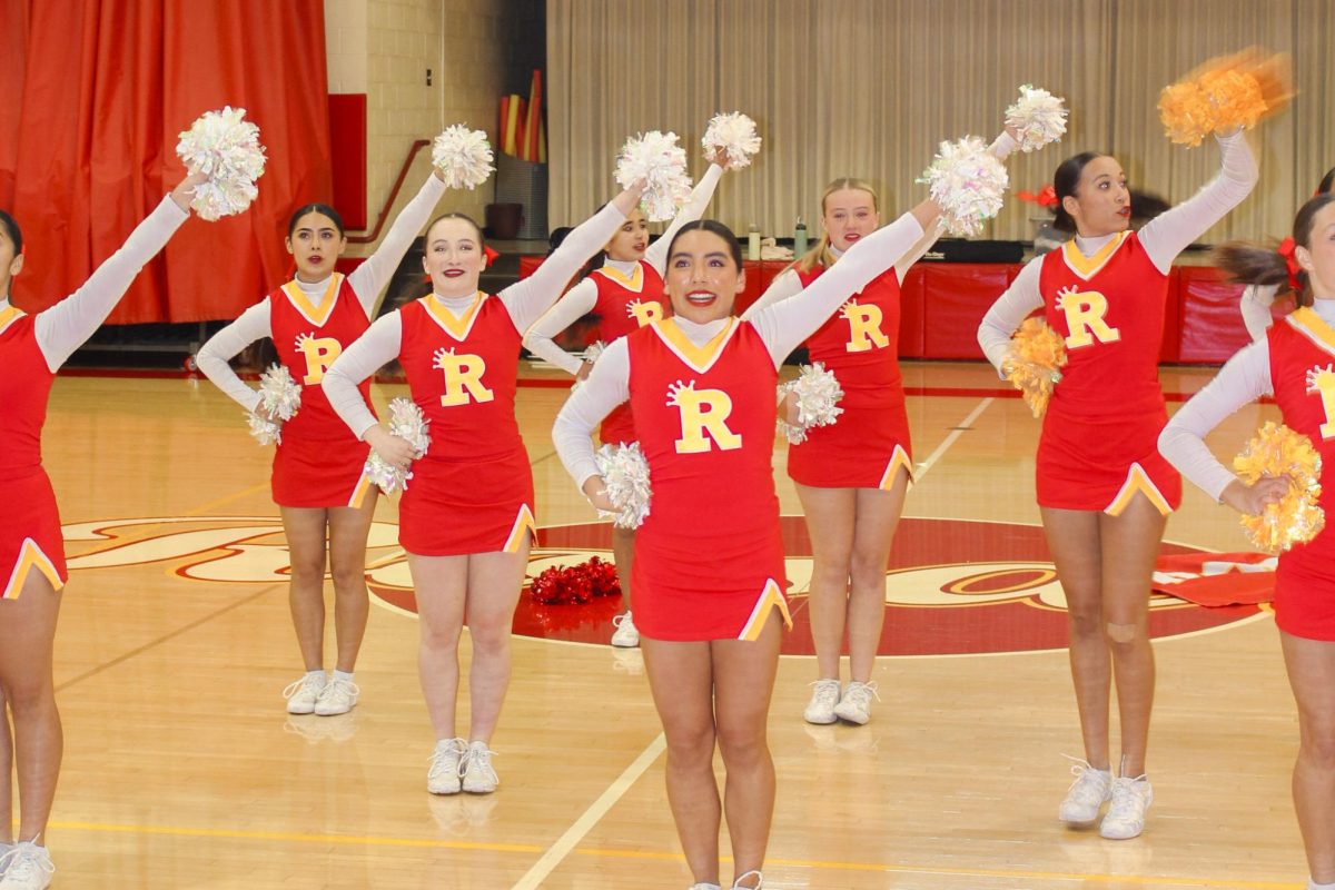 The Cheer team showing their school spirit at the rally! 